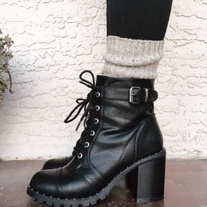 Diba brand lace up boot with side zipper.